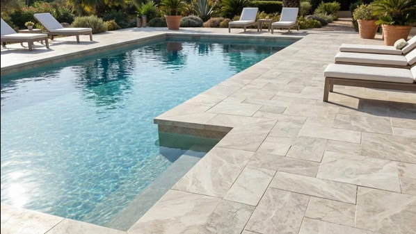 Travertine paver pool deck in Viera, FL